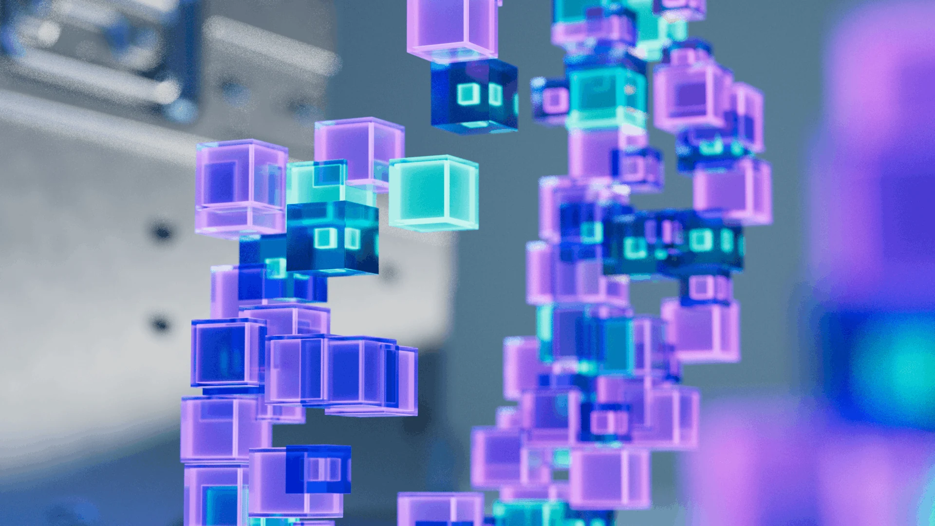 Close view of glowing translucent cubes in cyan, purple, and blue