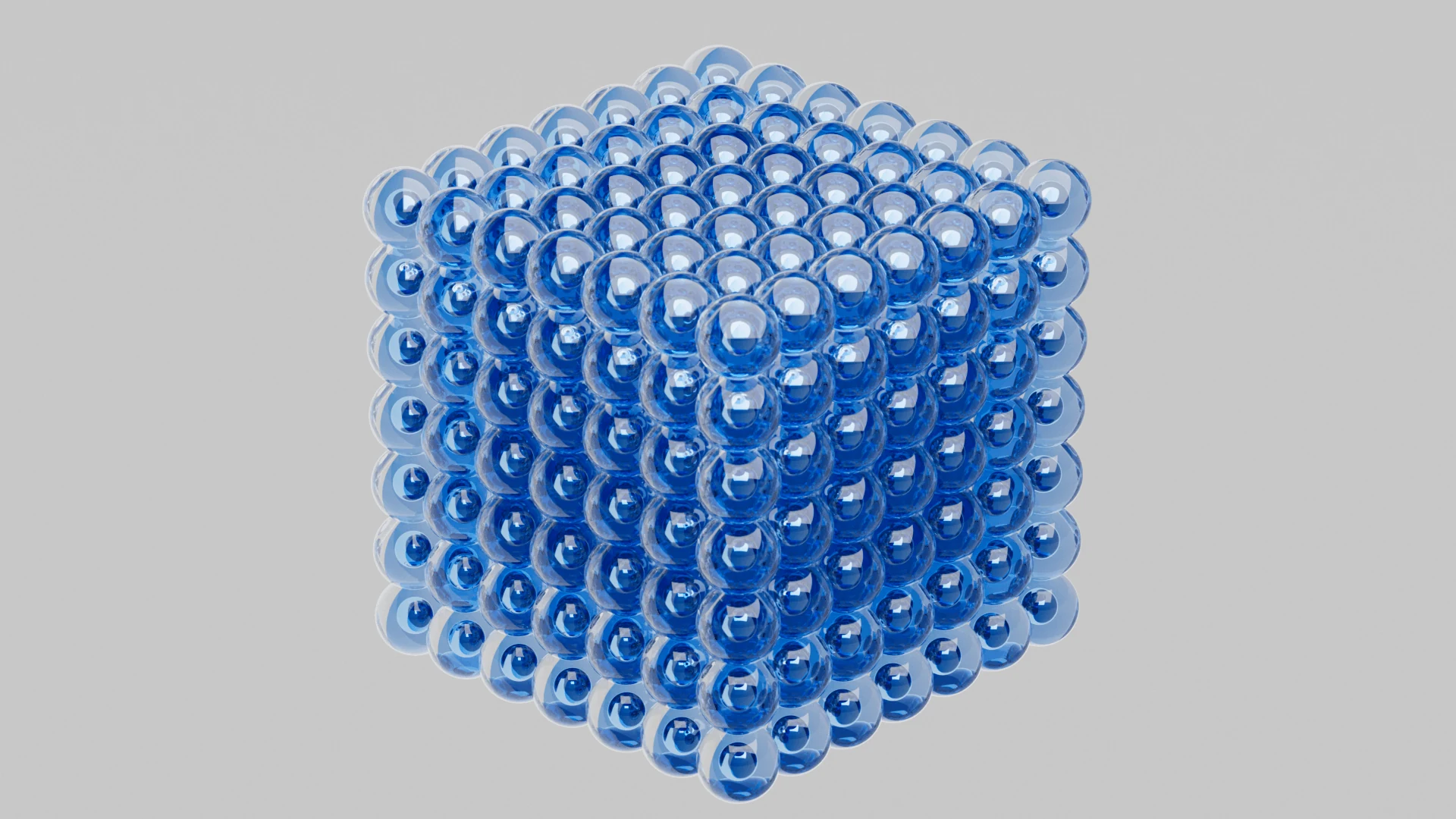 A cube formed from repeating reflective blue spheres
